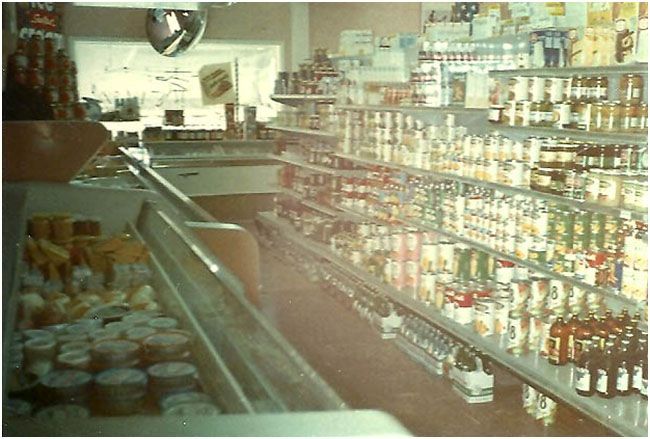 The inside of a&lp foods with shelves full of grocery items