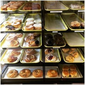 A variety of pastries and donuts are displayed at a&lp foods 