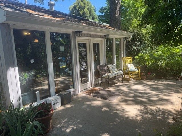 Vet playing with a golden retriever