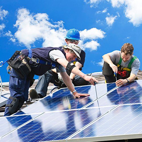 Workers Installing Solar Panels on the Roof — Ocean City, MD — Royal Plus Electric