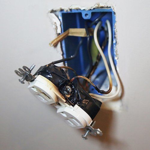 Wall Outlet with Burned Wires — Ocean City, MD — Royal Plus Electric
