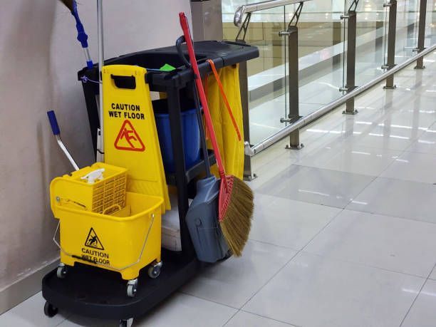 Yellow cleaning cart with 