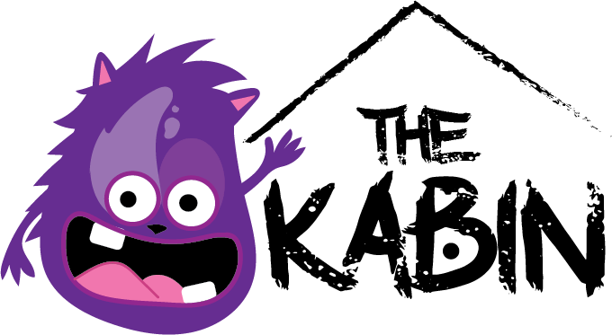 A purple monster is standing in front of a house that says the kabin