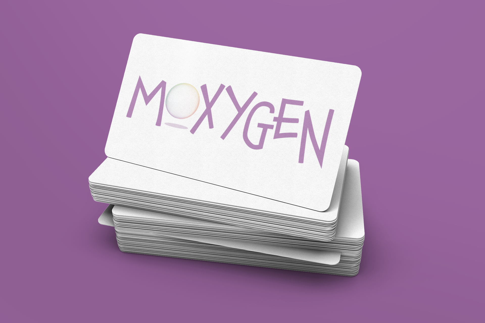 A stack of cards with the word moxygen on them