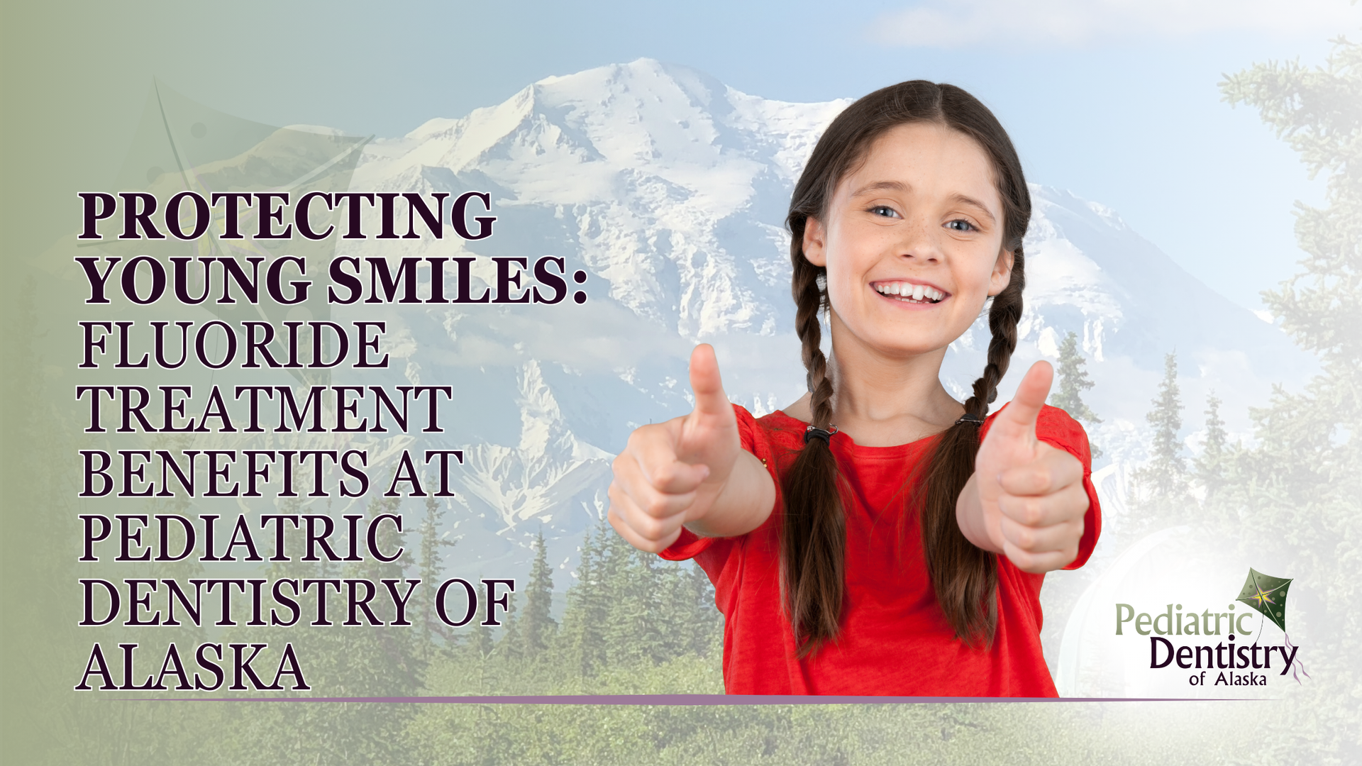 A young girl is giving a thumbs up in front of a mountain.