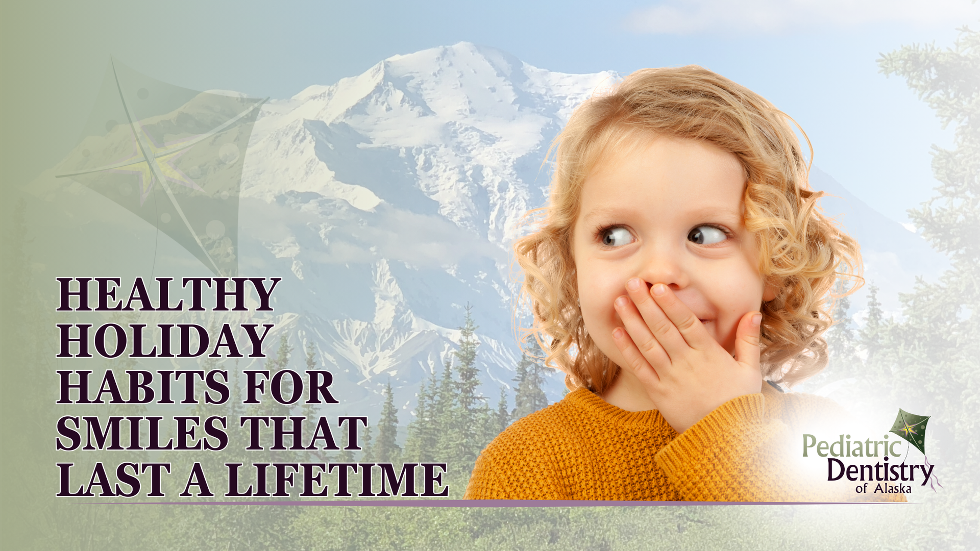 A little girl is smiling and covering her mouth with her hand.