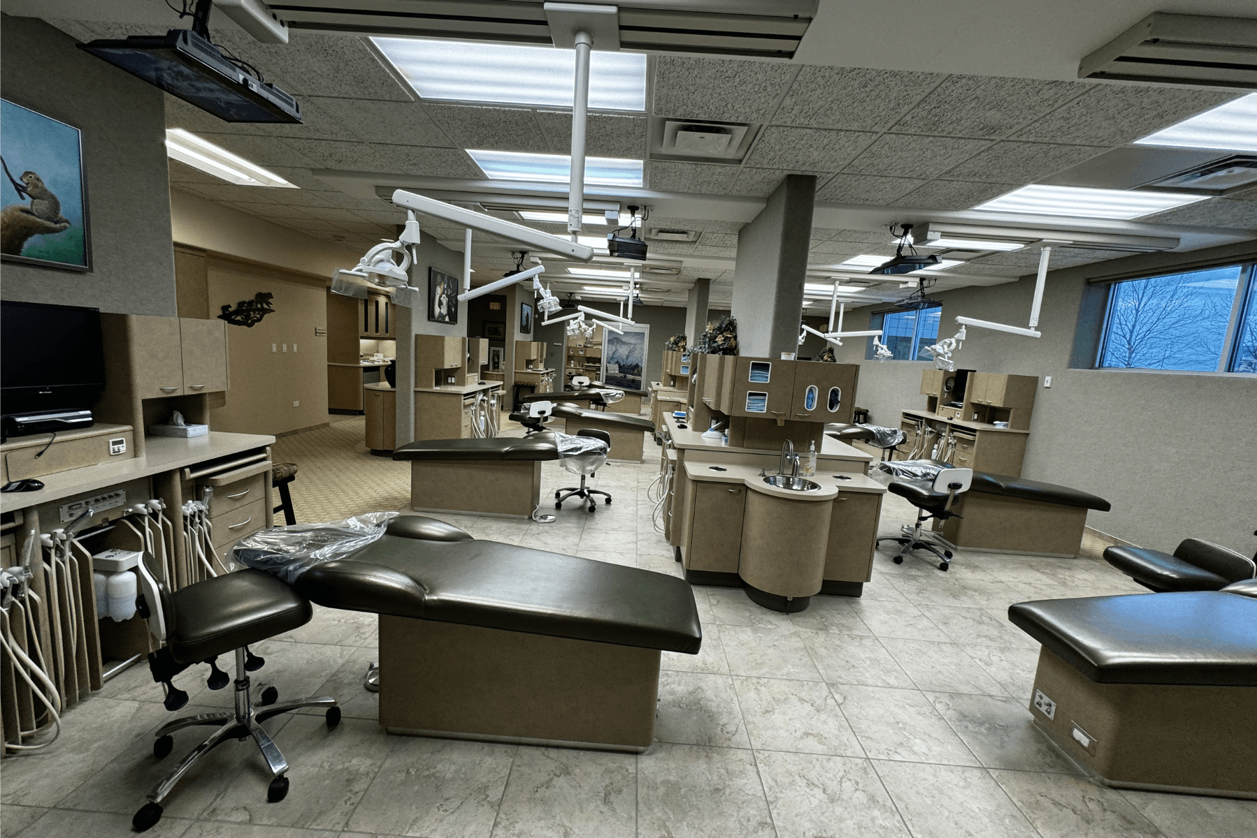 a large dental office with lots of dental chairs and tables | Pediatric Dentistry of Alaska | Best Pediatric Dentist In Wasilla and Palmer, Alaska