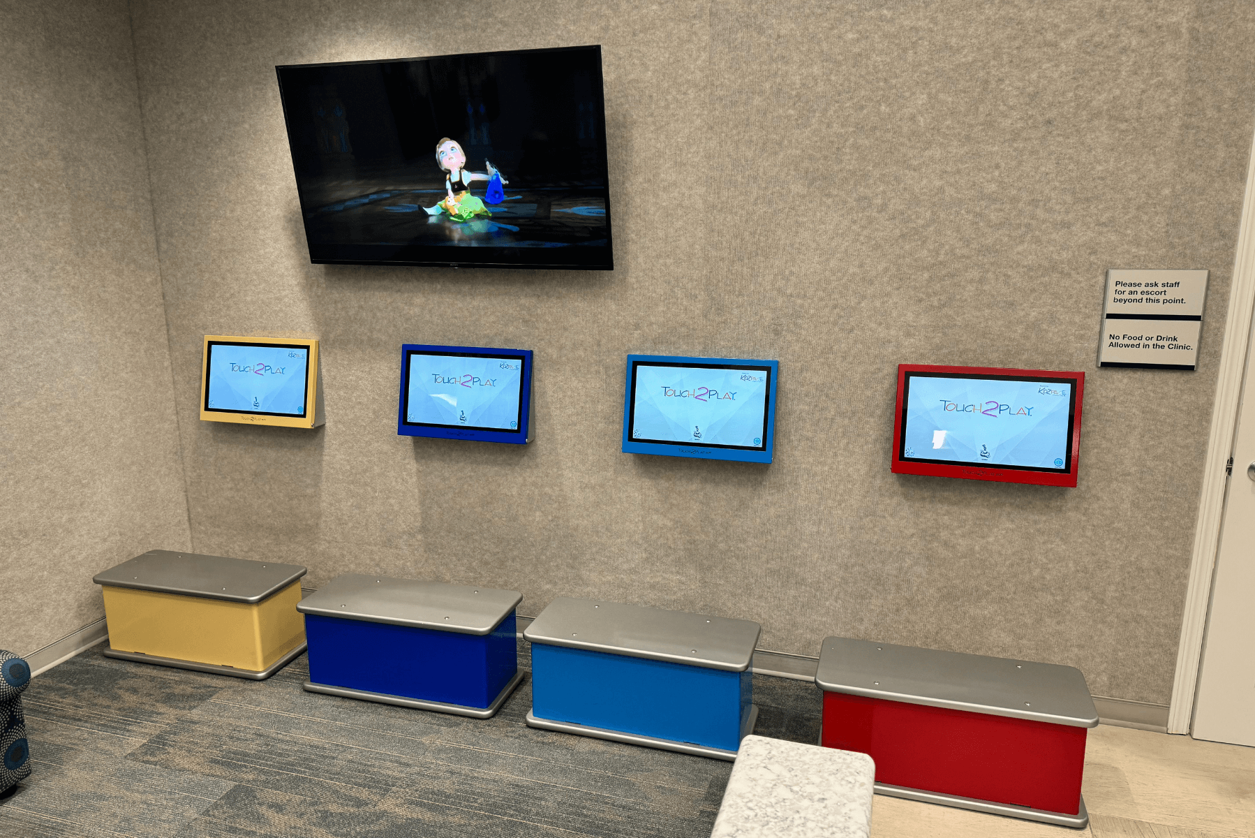 a room with a bunch of boxes and a tv on the wall | Pediatric Dentistry of Alaska | Best Pediatric Dentist In Wasilla and Palmer, Alaska