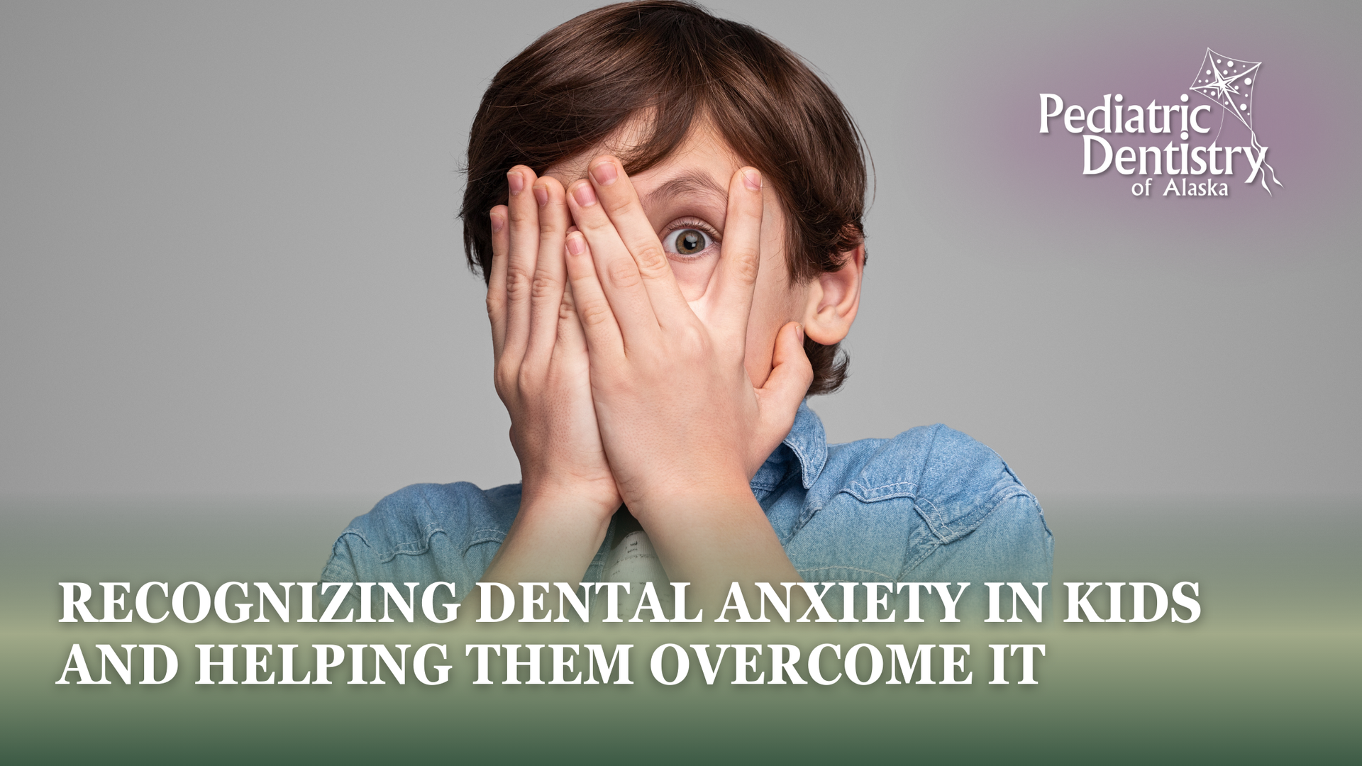 Boy covering face with hands, likely experiencing dental anxiety. Text: Recognizing dental anxiety in kids.