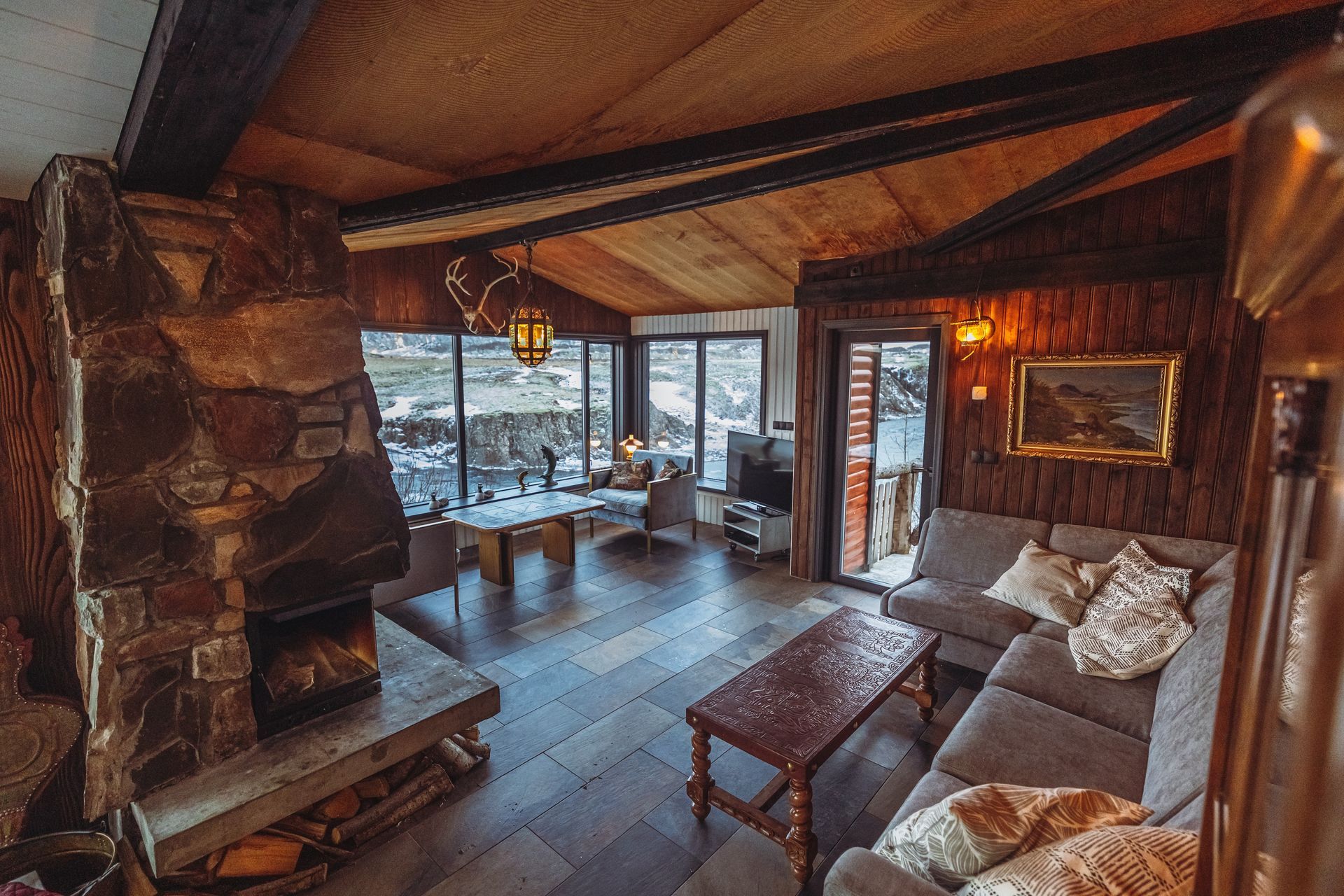 A living room filled with furniture and a fireplace.