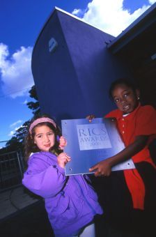 Children holding an award