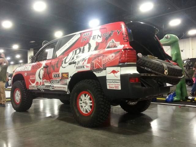 A red and white vehicle with the word nmd on it