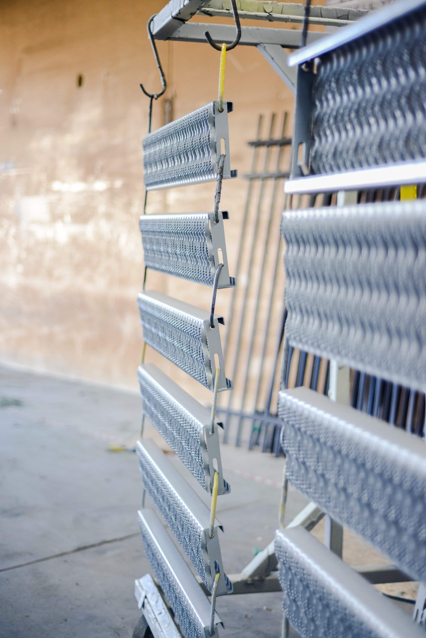 A metal fence is sitting in front of a building.