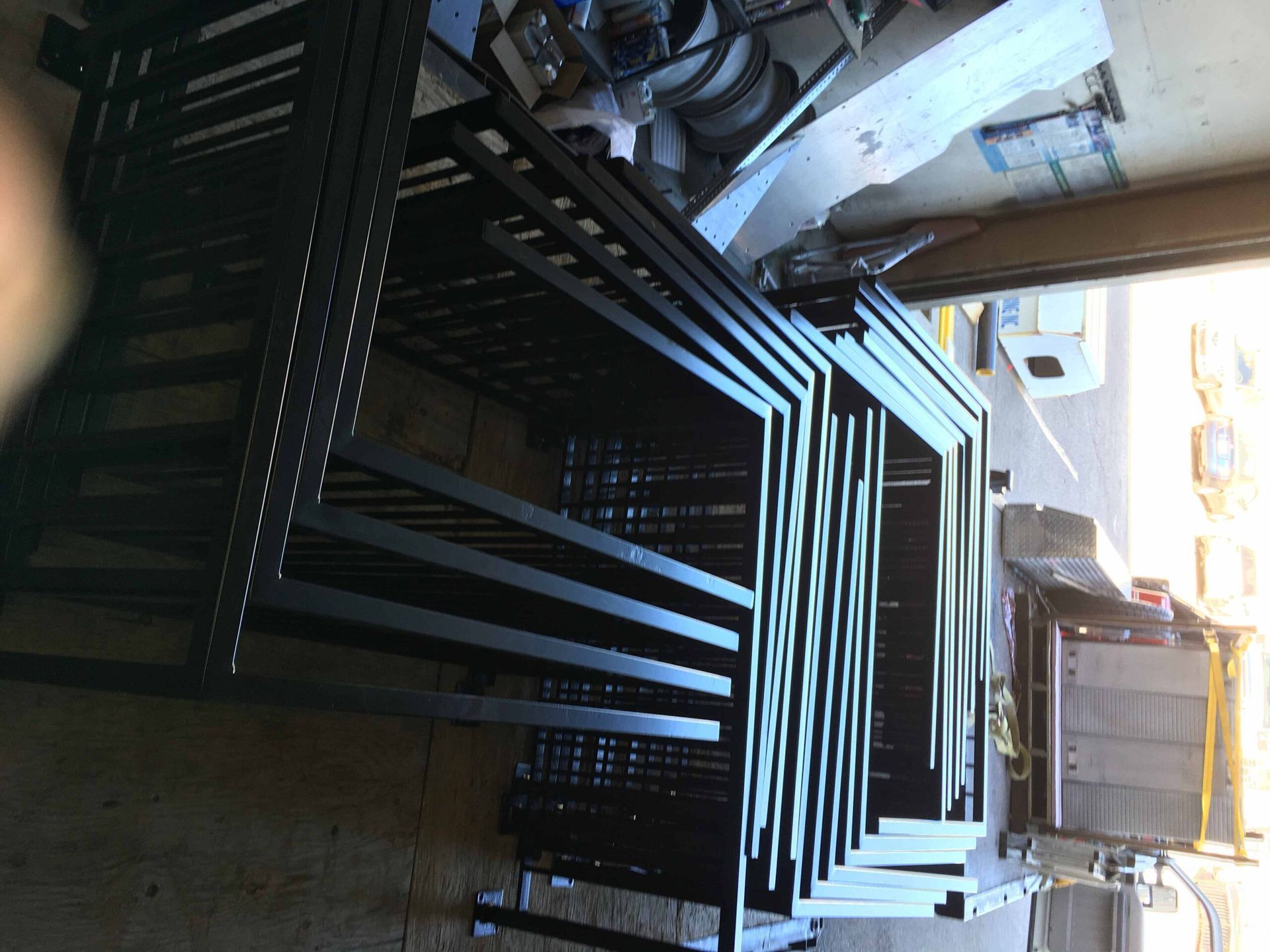 A bunch of metal stairs are stacked on top of each other