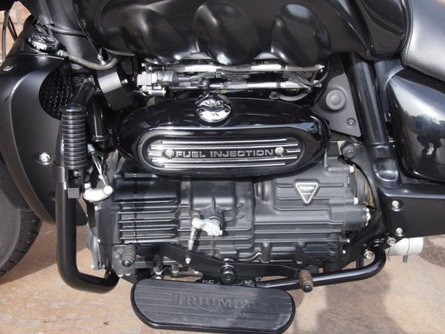 A close up of a triumph motorcycle engine
