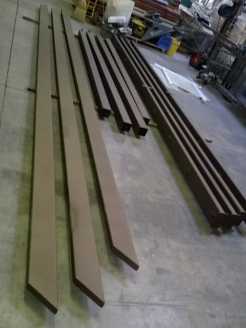 A bunch of pieces of wood are laying on the floor