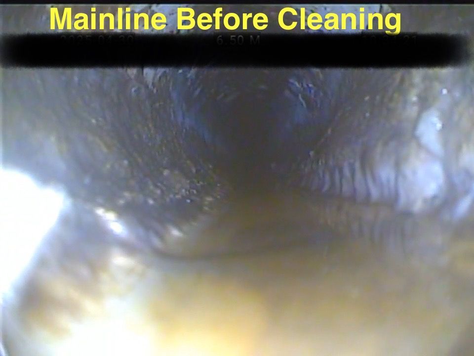 A picture of a mainline before cleaning is shown