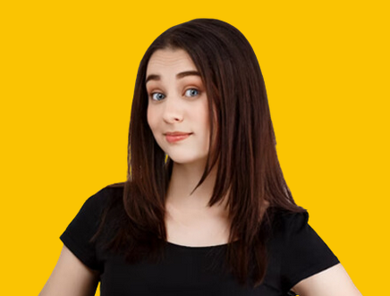 A woman in a black shirt is standing in front of a yellow background