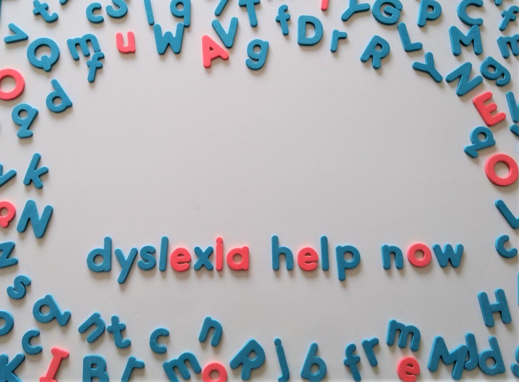 alphabet letters on white board spell dyslexia help now