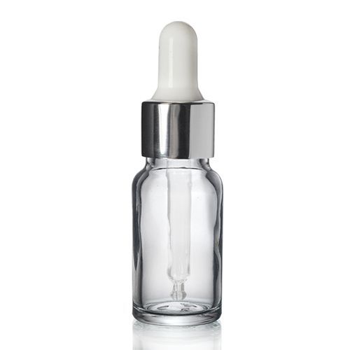 a clear glass bottle with a silver dropper on a white background .