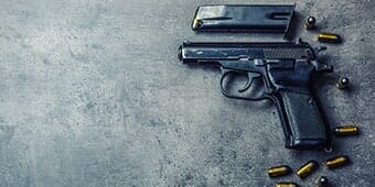 Gun on concrete — Gunsmiths in Sedalia, CO