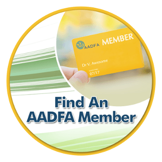 A person is holding an aadfa member card