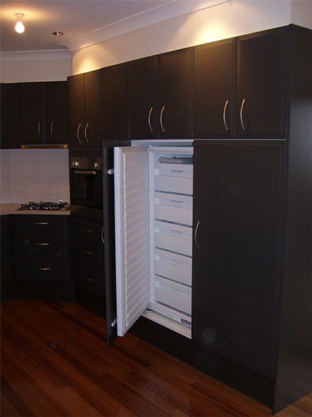 modern kitchen with fridge open