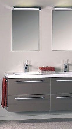 bathroom sink with red towels