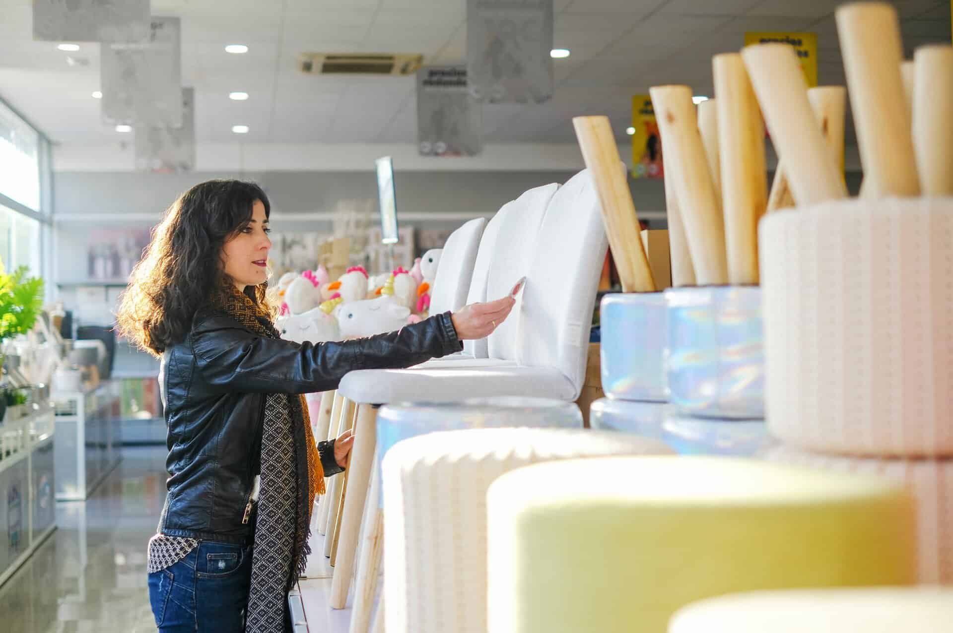 Woman Buying Furnitures In Shop