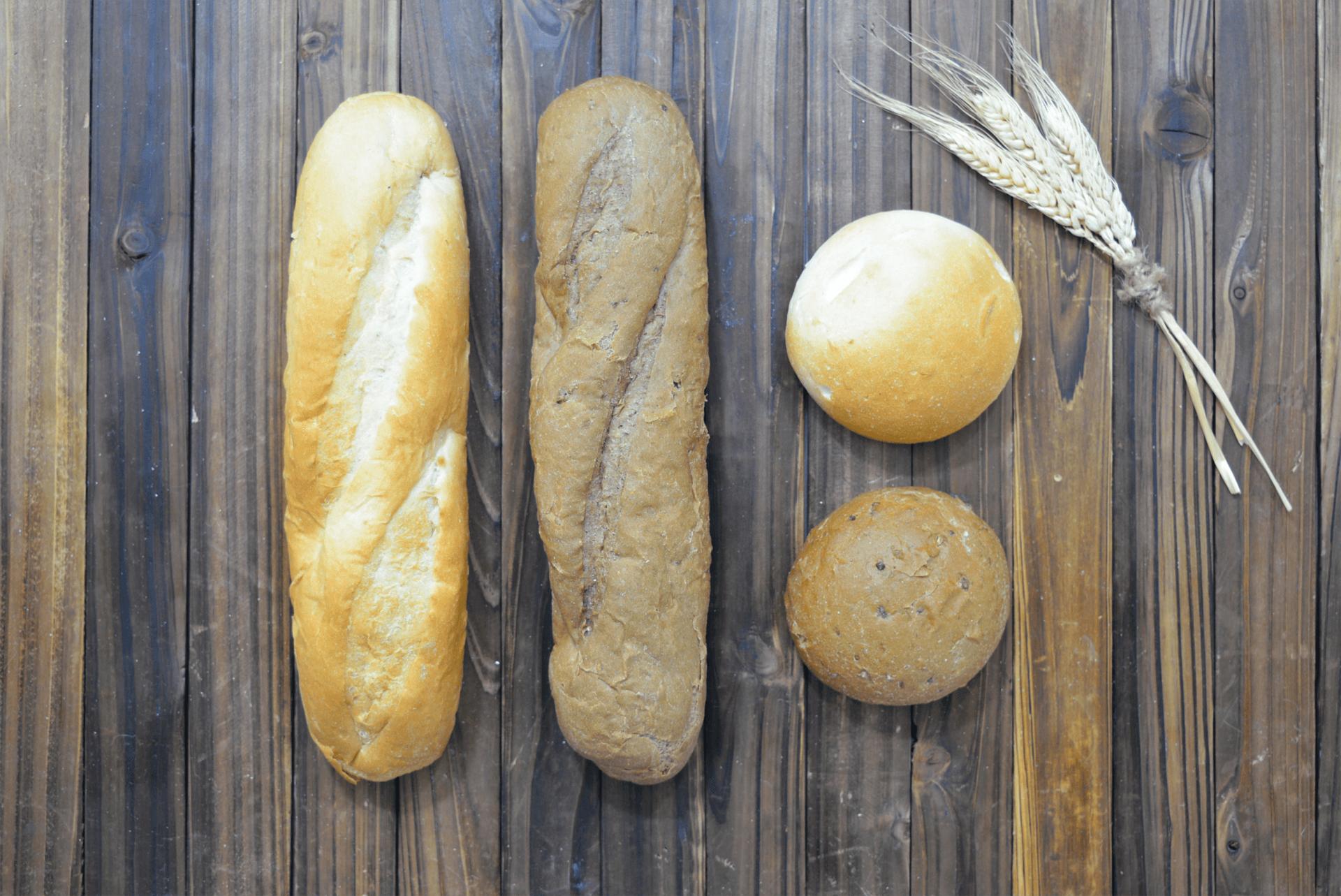 Wooden background with European Bread