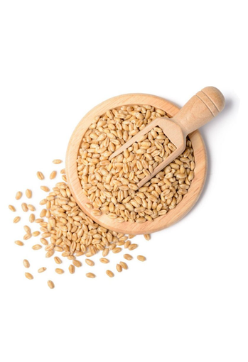Wheat Seeds in a wooden bowl with a wooden spoon