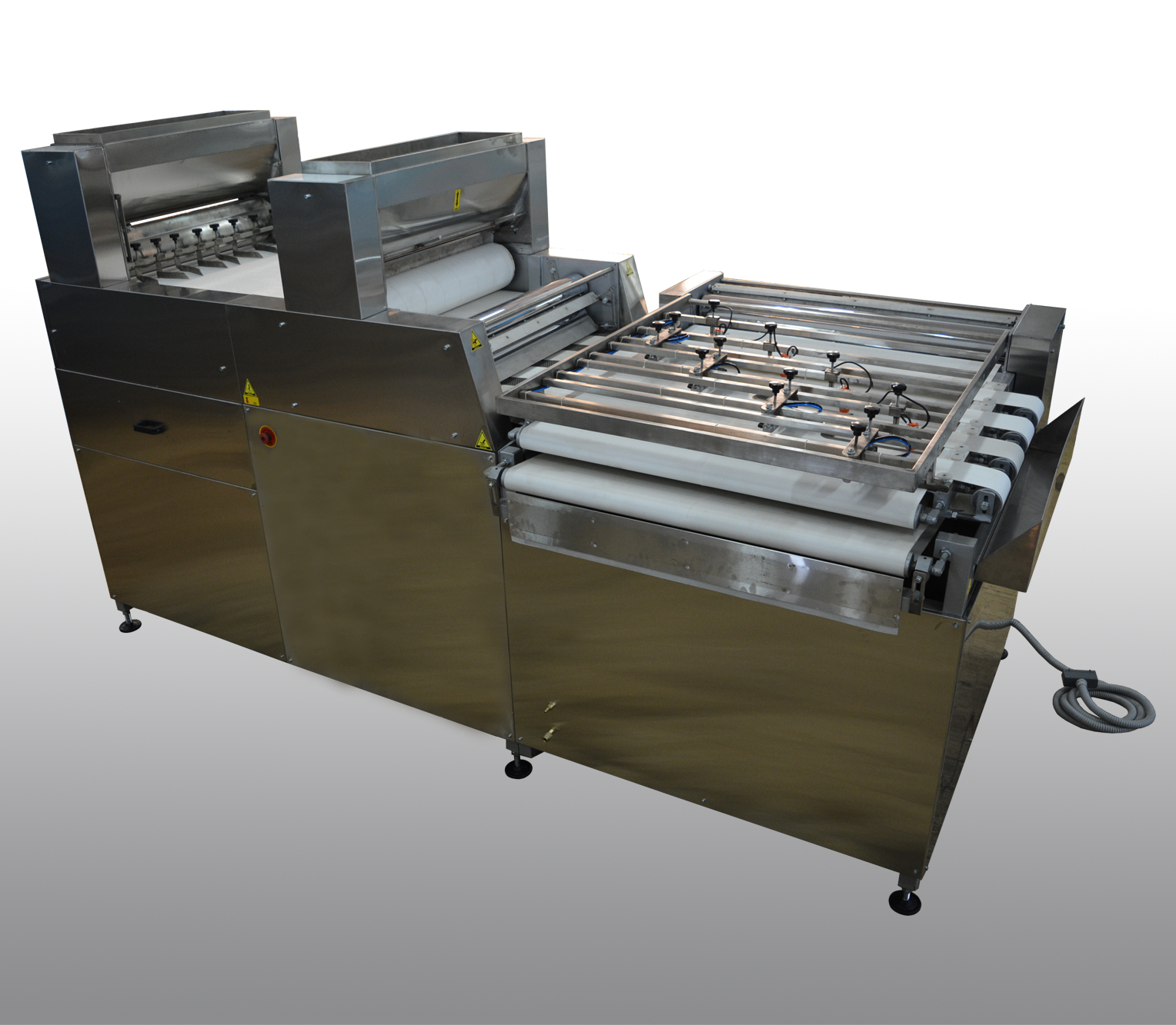 Automatic Dough Flattener as part of the automatic Arabic Pita Bread line