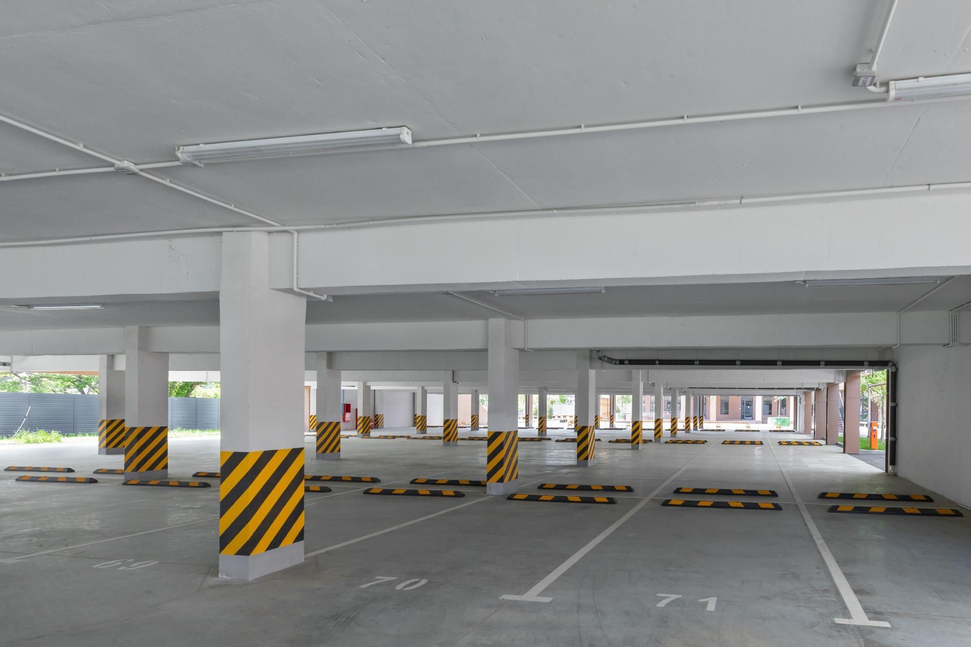 A Parking Garage With a Lot of Parking Spaces and Columns — North Coast Line Marking in Talofa, NSW