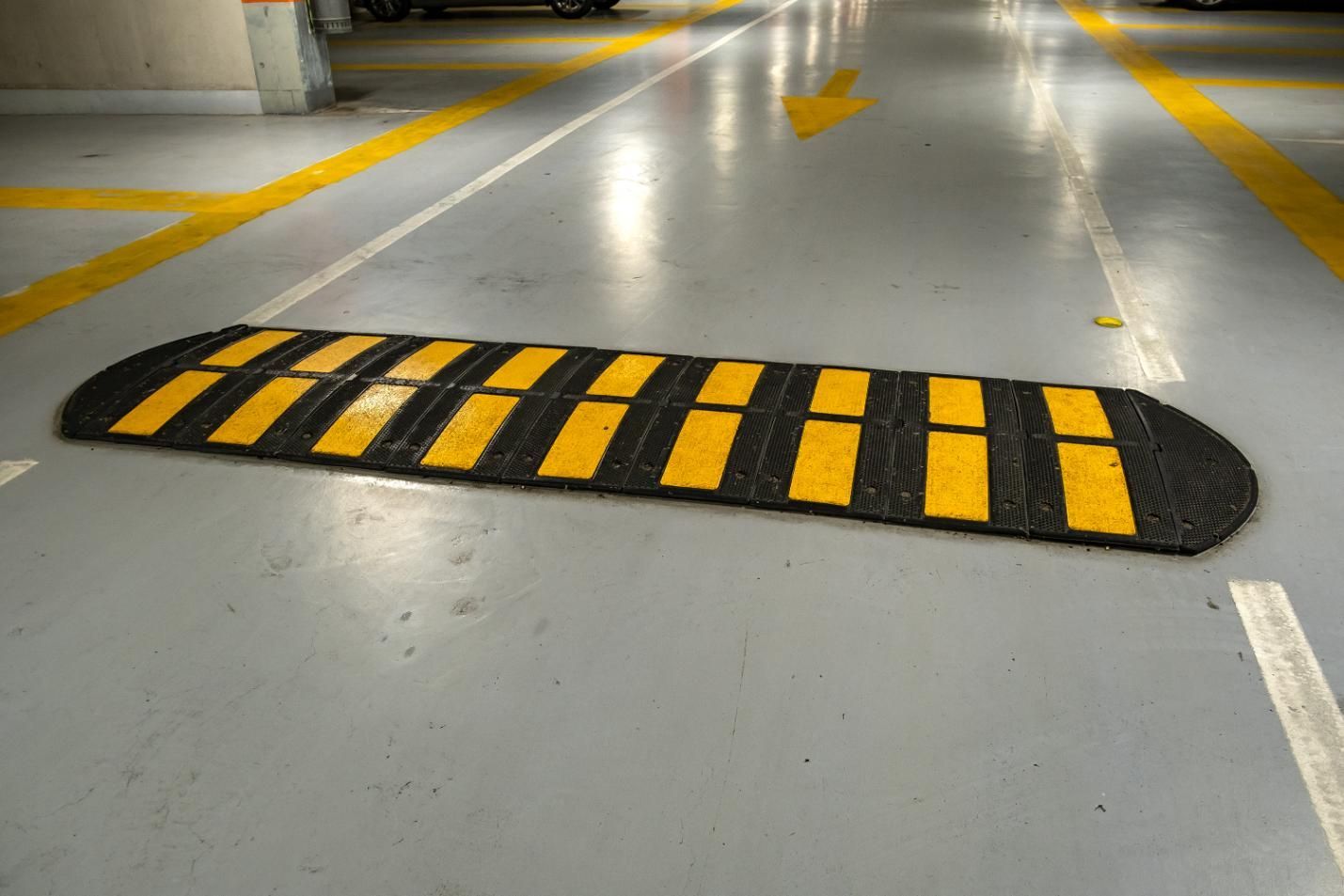 A Black and Yellow Speed Bump in a Parking Garage — North Coast Line Marking in Ballina, NSW