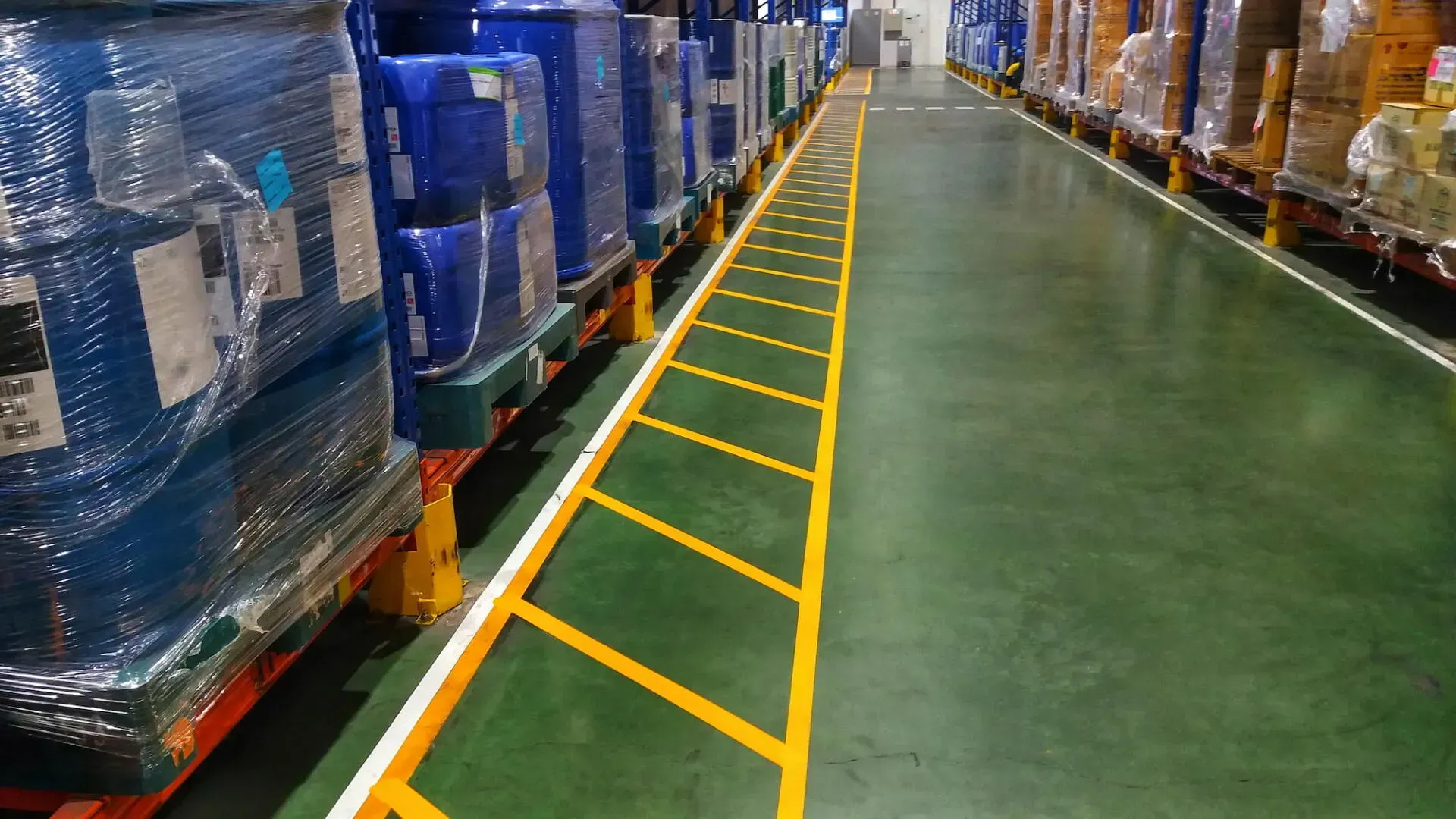 A Warehouse Filled With Lots of Barrels and Pallets — North Coast Line Marking in Casino, NSW
