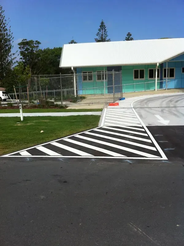 A Blue Building With a Handicapped Ramp in Front of It — North Coast Line Marking in Ballina, NSW