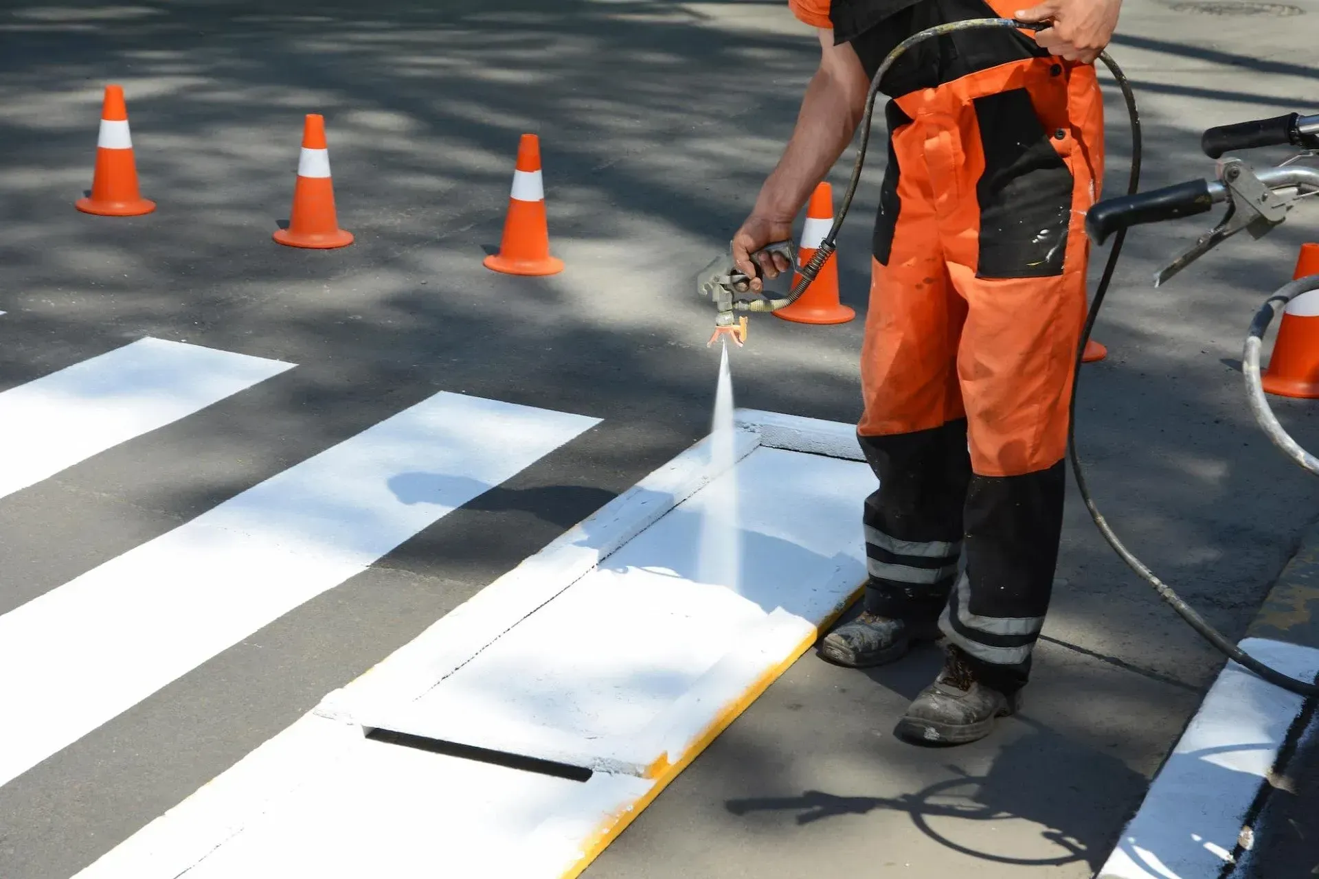A Man is Spraying White Paint on a Crosswalk — North Coast Line Marking in Talofa, NSW