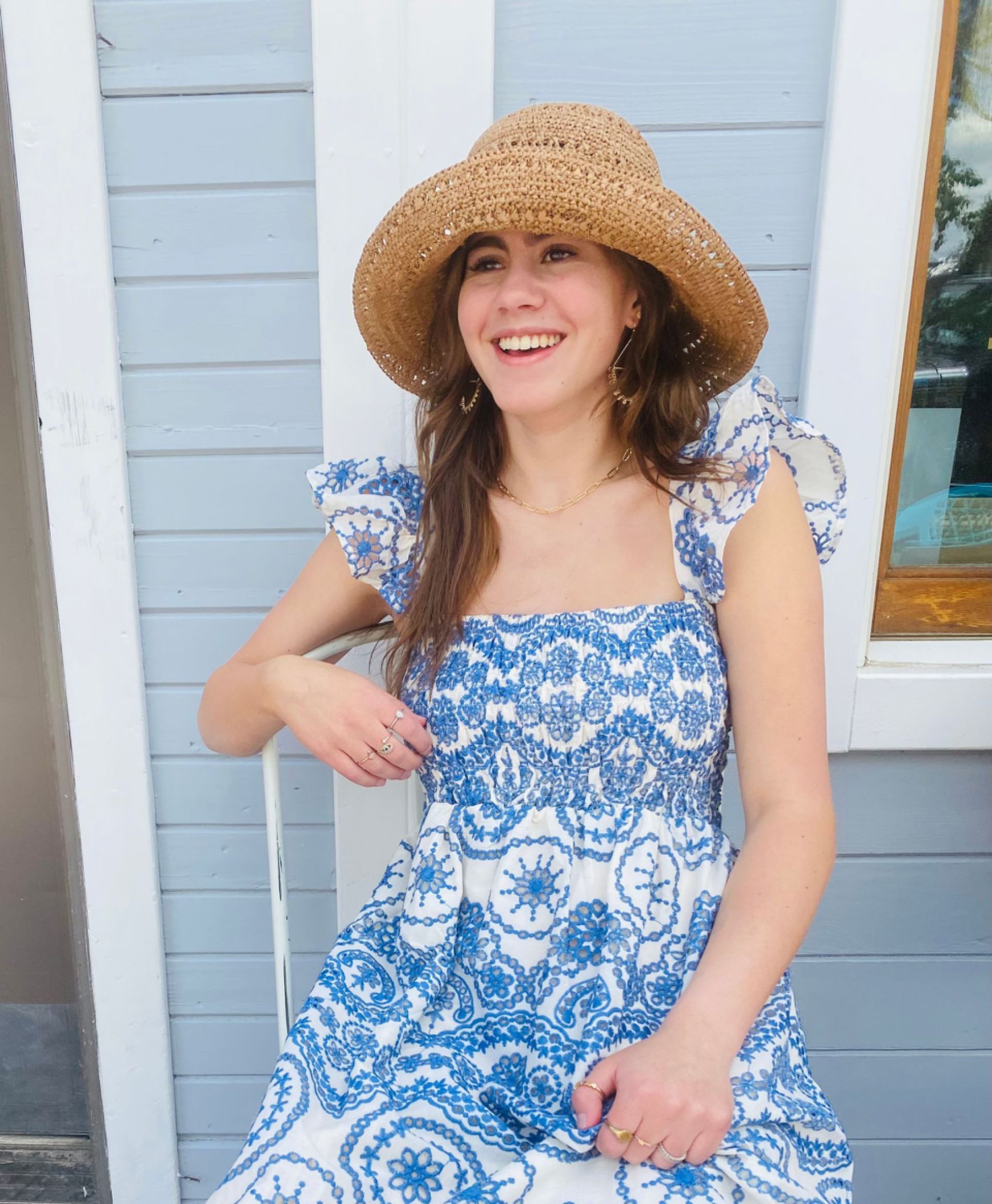 A bunch of bracelets are sitting on a silver plate.