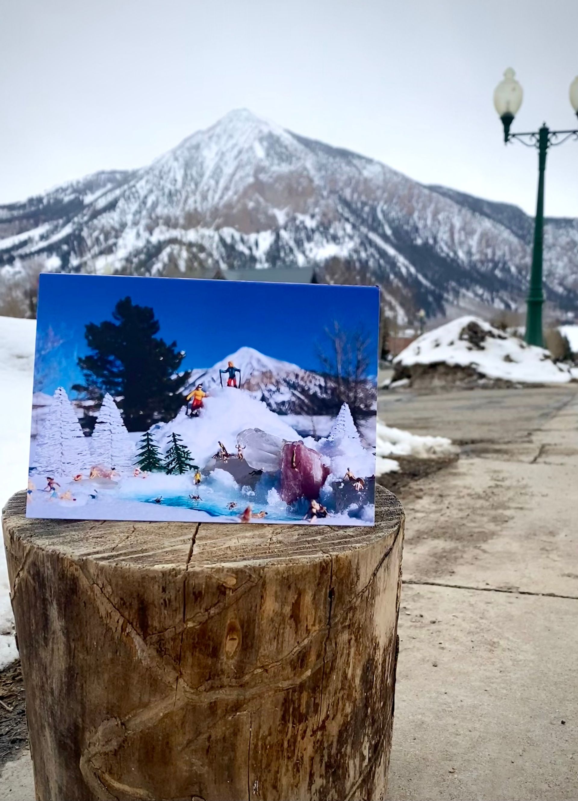 A shelf filled with lots of different types of makeup products.