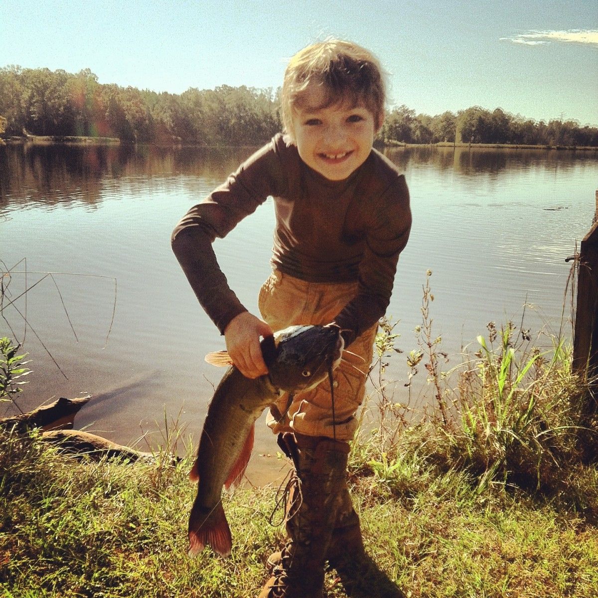a-kid-with-a-caught-fish