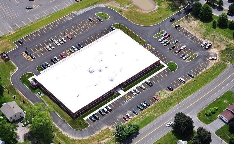 Office Building White Roof — Syracuse, NY — Napierala Consulting