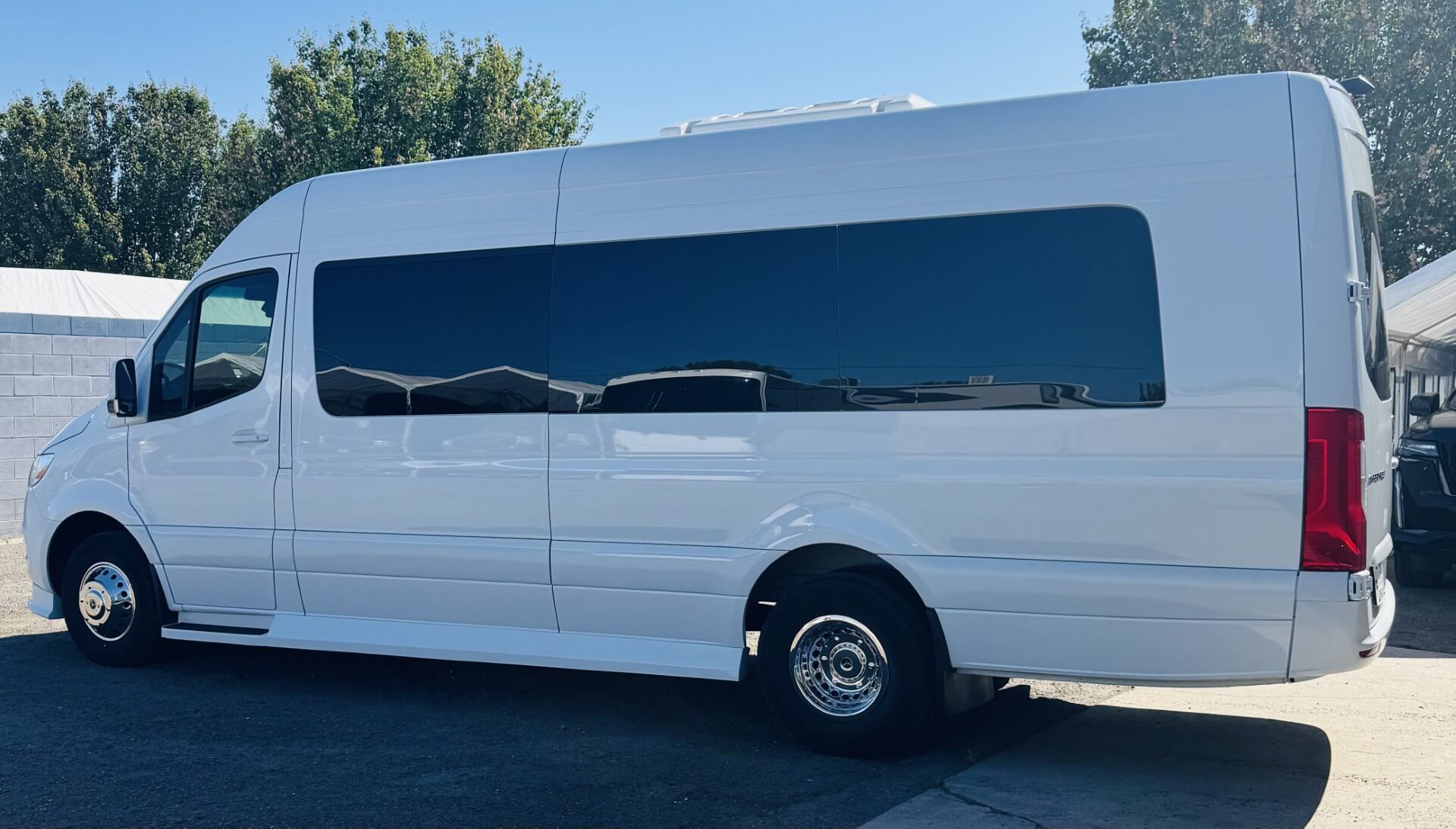 white luxury sprinter rental