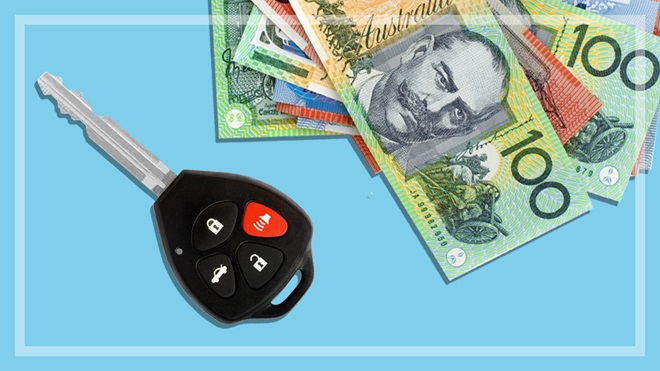 Person ticking off a printed checklist titled “Insurance for rental car” with Brisbane map in background