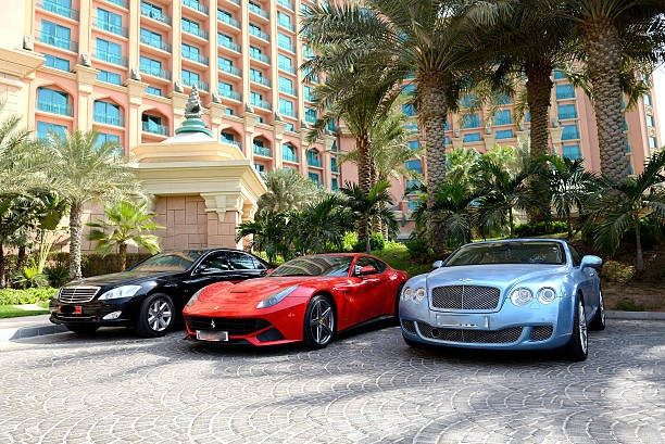 Various supercar brands including Lamborghini, Ferrari, and Porsche lined up for rental in Brisbane