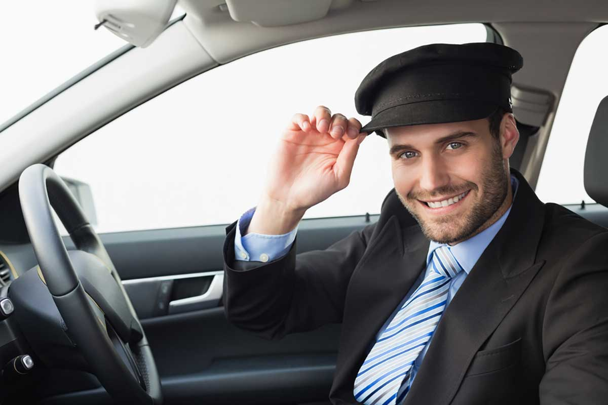 Businesswoman booking a personalised chauffeur ride in Sydney using a mobile app in a luxury car