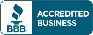 A blue sign that says accredited business on it