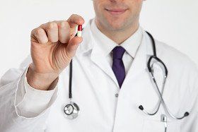 Doctor holding a medical device