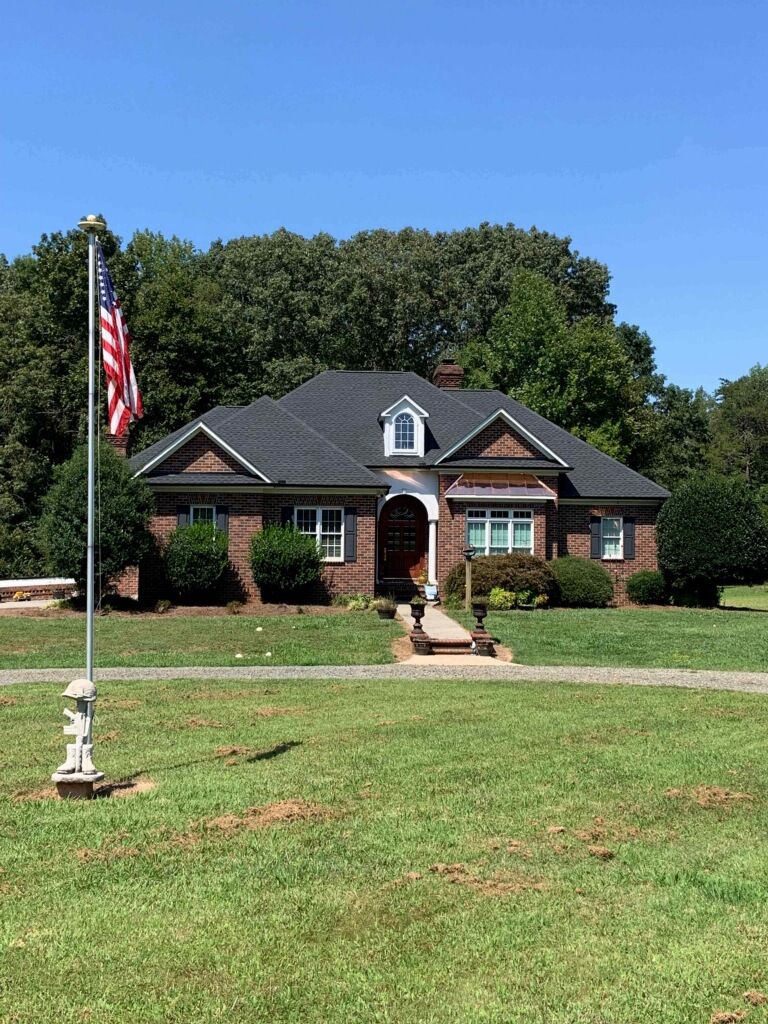 House View With Flag — Charlotte, NC — Valhalla Roofing