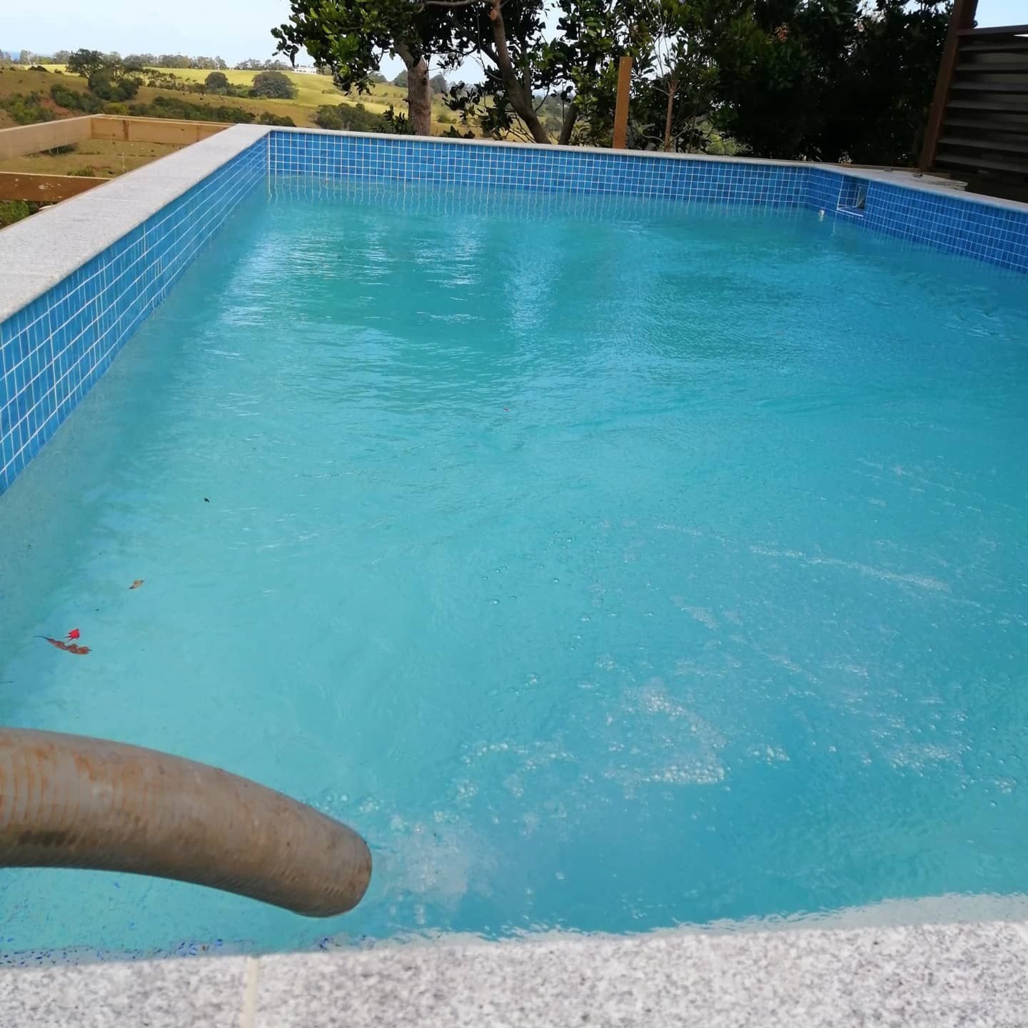 A Large Swimming Pool with A Hose Coming Out Of It — Water Please In Ballina, NSW
