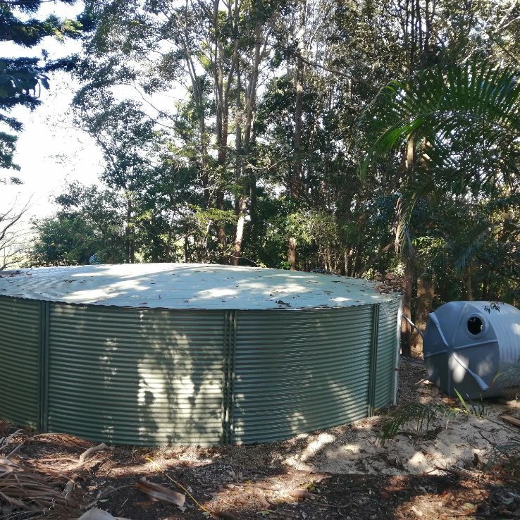 A Large Metal Tank in the Middle of a Forest — Water Please In Brunswick Heads, NSW